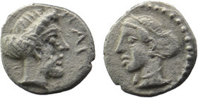 Cilicia. Nagidos circa 400-380 BC.
Obv: Head of Aphrodite to right, her hair bound up at the back; behind, astragalos.
Rev: Head of Dionysos to left...