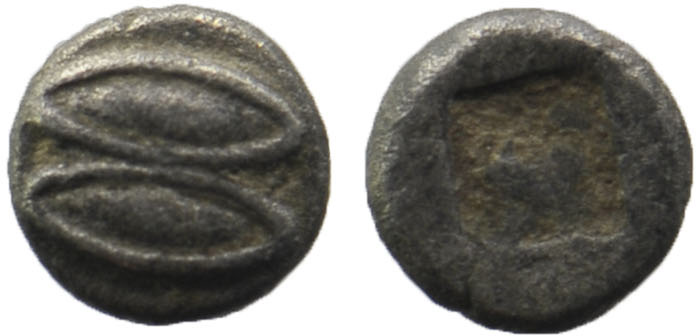 Lesbos, uncertain mint AR Tetartemorion. Circa 450 BC.
Obv: Two eyes (or grains...