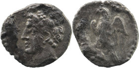 CILICIA, Uncertain. 4th century BC. AR Obol. 
Head left, wearing wreath of grain ears 
Rev: Eagle, with spread wings, standing left. 
SNG France 474; ...