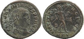 Maximinus II 305- 311 AD. Follis Cyzicus mint. Silvered
laureate head of Galerius right./ Mars advancing right, holding spear and trophy. M KV in exer...