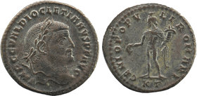 Diocletian (284-305). AE Follis. Cyzicus
Laureate head right/ Genius standing left holding patera and cornucopiae.
 RIC VI 12a.
8,22 gr. 27 mm