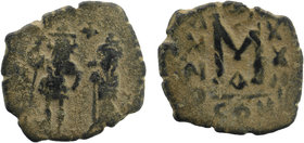 Arab-Byzantine, Umayyad Caliphate Æ Fals. "Pseudo-Byzantine" mint, circa AD 642-646. 
Heraclius and Heraclius Constantine standing facing, each holdin...