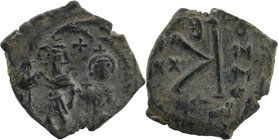 Justin II, with Sophia. 565-578. AE Half Follis
Justin and Sophia, both nimbate, enthroned facing; Justin holding globus cruciger and Sophia holding c...