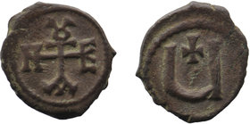 Phocas. AD 602-610. Antioch Pentanummium AE
Monogram of Phocas / Large U, cross above.
1,55 gr. 14 mm