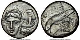 MOESIA. Istros. Ca. 4th century BC. AR drachm (16mm, 2h). NGC Choice VF. Facing male heads, the right inverted / Sea-eagle left, grasping dolphin in t...