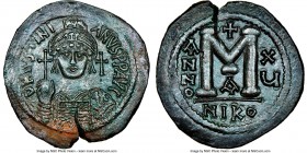 Justinian I the Great (AD 527-565). AE follis or 40 nummi (39mm, 7h). NGC AU. Nicomedia, 1st officina, Regnal Year 15 (541/2). D N IVSTINI-ANVS PP AVG...