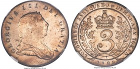 British Colony. George III 3 Guilder 1809 MS63 NGC, KM8, Prid-4. The appearance of this large colonial piece is remarkably Prooflike, its engraving ve...