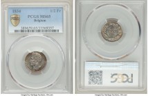 Leopold I 1/2 Franc 1834 MS65 PCGS, KM6. A strong strike accompanied with colorful hues in the fields make this a premium offering.

HID09801242017