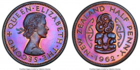 Elizabeth II Proof 1/2 Penny 1962 PR64 Brown PCGS, KM23.2. Neon violent and magenta hues make a statement when this coin is rotated in the light.

HID...