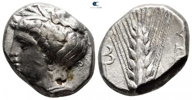 Lucania. Metapontion 340-330 BC. 
Nomos AR

19mm., 6,64g.

Head of Demeter ...