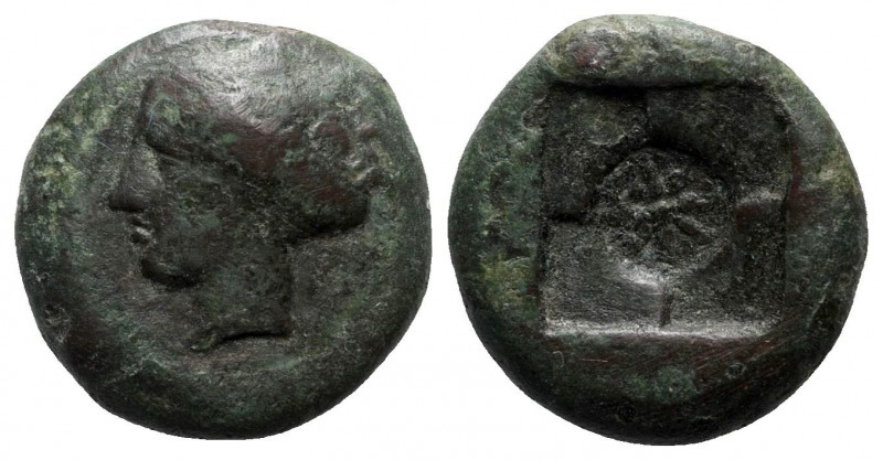Sicily. Syracuse 405-375 BC. 
Hemilitron Æ

15mm., 4,69g.

Head of nymph le...