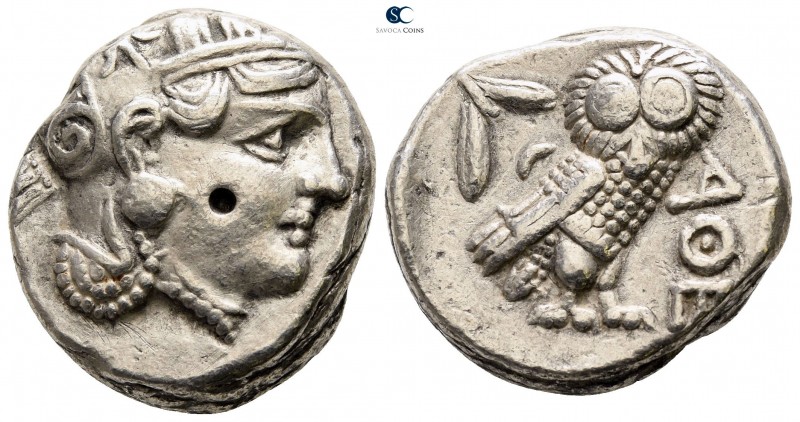 Attica. Athens circa 353-294 BC. 
Tetradrachm AR

22mm., 16,79g.

Helmeted ...