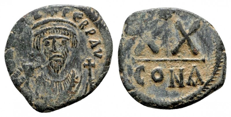 Phocas AD 602-610. Constantinople
Half follis Æ

23mm., 5,80g.

[D N FOC]A ...