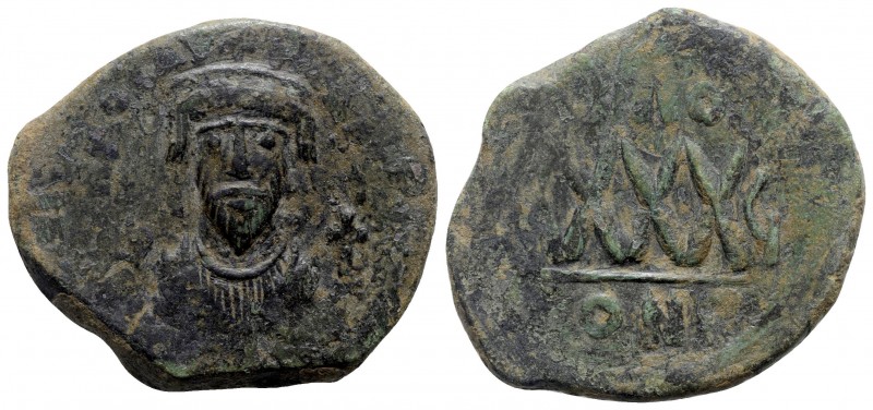 Phocas AD 602-610. Constantinople
Follis Æ

33mm., 14,61g.

Crowned bust fa...