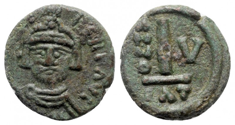 Heraclius AD 610-641. Catania
10 Nummi Æ

14mm., 2,77g.

Crowned, draped an...