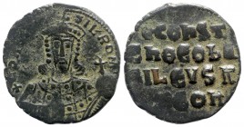 Constantine VII Porphyrogenitus with Romanus I AD 913-959. Struck AD 945-circa 950. Constantinople. Follis Æ