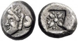 Greek Coins   Cyrene  Drachm circa 495-475, AR 4.36 g. Head of man-headed bull l; behind, silphium fruit. Rev. Floral pattern set in star formation ar...