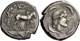 Greek Coinage 
 Syracuse 
 Tetradrachm 466-460, AR 17.14 g. Slow quadriga driven r. by charioteer leaning forward, holding reins and kentron ; above...