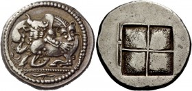 Greek Coinage 
 Macedonia, Acanthus 
 Tetradrachm, about 470 BC, AR 17.26 g. Lioness (?) r., attacking bull kneeling l.; below triple exergual line,...