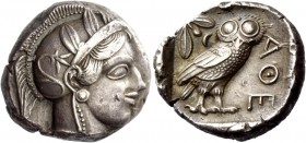 Greek Coinage 
 Attica, Athens 
 Tetradrachm after 449 BC, AR Head of Athena r. wearing crested Attic helmet. Rev. AÈÅ Owl standing r. with closed w...