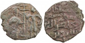 SALDUQIDS: 'Izz al-Din Salduq, 1129-1168, AE fals (or dirham) (4.41g), NM, ND, A-1890, two standing figures, right figure (St. Demetrius?) passing the...