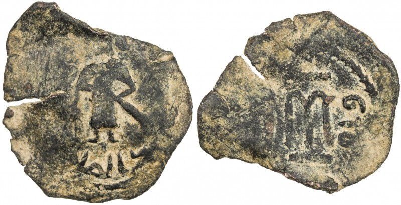 ARAB-BYZANTINE: Standing Caliph, ca. 693-697, AE fals (2.01g) (Qinnasrin), ND, A...