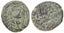 UMAYYAD: Anonymous, ca. 710-730, AE fals (1.62g), A-145A, W-Th.12 (same reverse die), North African mint, without mint name, helmeted head right in ob...