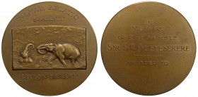 CEYLON: AE medal (120.1g), ND (ca. 1930?), 64mm unsigned bronze award medal for the Royal Asiatic Society (Ceylon Branch), 2 elephants cavorting in po...