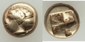 IONIA. Phocaea. Ca. 477-388 BC. EL sixth-stater or hecte (10mm, 2.51 gm). Fine. Female head left, hair bound in netted saccos and sphendone, seal swim...