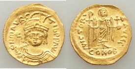 Maurice Tiberius (AD 582-602). AV solidus (22mm, 3.50 gm, 6h). AU, edge filed. Constantinople, 3rd officina. o N mAVRC-TIb PP AVG, draped and cuirasse...