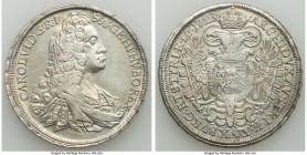Karl VI Taler 1723 XF/AU (cleaned), Graz mint, KM1610.1, Dav-1040. Fine hairlines can be found throughout the obverse.

HID09801242017