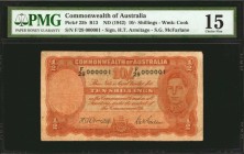 AUSTRALIA. Commonwealth of Australia. 10 Shillings, ND (1942). P-25b. Serial Number 1. PMG Choice Fine 15.
An impressive serial number "1" is seen on...