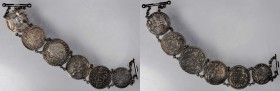 ITALY. Papal States. Coin Bracelet, ND.
Bracelet is approximately 7" long and made of six silver coins, mostly Papal State issues, dating from 16th t...