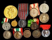 ITALY. Group of Military Awards and Commemorative Medals (21 Pieces), Primarily 20th Century. Grade Range: VF to UNC.
One is silver, the others in mi...