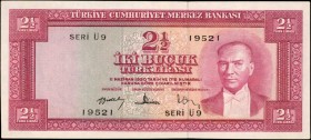 TURKEY. Türkiye Cümhuriyet Merkez Bankasi. 2 1/2 Turk Lirasi, 1930. P-152a. About Uncirculated.
An appealing lilac note with President Kemal Ataturk ...