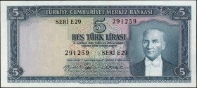 TURKEY. Türkiye Cümhuriyet Merkez Bankasi. 5 Turk Lirasi, 1930. P-155a. About Uncirculated.
President Mustafa Kemal Atatürk seen at right. Women harv...