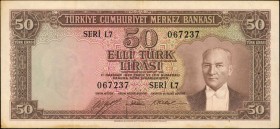 TURKEY. Türkiye Cümhuriyet Merkez Bankasi. 50 Turk Lirasi, 1930. P-164a. Very Fine.
A scarce higher denomination of series in brown with President Ke...