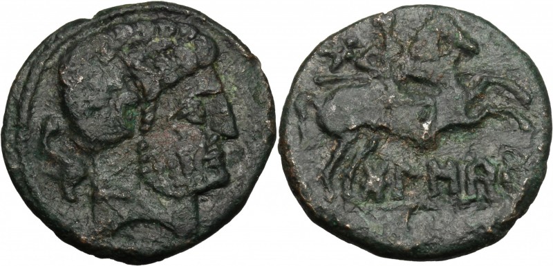 Hispania. AE 24 mm. Late 2nd century BC. D/ Bearded head right; dolphin behind. ...