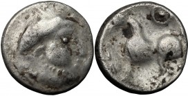 Celtic World. Celtic, Eastern Europe. AR Drachm type Kugelwange, 2nd-1st century BC. D/ Head right, laureate. R/ Horse left; above, circle with dot in...