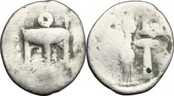 Greek Italy. Bruttium, Kroton. AR Triobol, c. 400-350 BC. D/ Tripod with legs terminating in lion's feet; to right, leaf. R/ Thunderbolt; to left, sta...