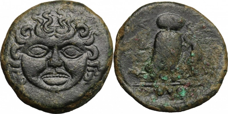 Sicily. Kamarina. AE Tetras, 425-405 BC. D/ Gorgoneion. R/ Owl standing right, h...
