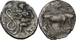 Sicily. Selinos. AR Litra, c. 410 BC. D/ Nymph seated left on rock, extending right hand to touch coiled serpent before her. R/ Man-headed bull right....