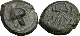 Sicily. Tauromenion. Campanian Mercenaries (c. 354-344 BC). AE, 354-344 BC:. D/ Campanian helmet right. R/ Monogram within laurel-wreath. CNS III, 2. ...