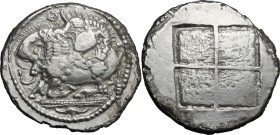 Continental Greece. Macedon. AR Tetradrachm, Acanthos mint, before 480 BC. D/ Lion on back of bull right, tearing its bottom with claws and teeth; in ...