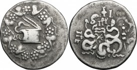 Greek Asia. Ionia, Ephesos. AR Cistophoric Tetradrachm, 133-67 BC. D/ Cista mystica within ivy-wreath. R/ Two coiled serpents; between them, bow-case....