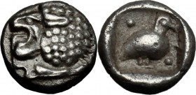 Greek Asia. Caria, Mylasa. AR Tetartemorion, 420-390 BC. D/ Head of lion left. R/ Bird standing right; before and behind, pellet; all in incuse square...