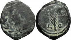 Greek Asia. Judaea. Valerius Gratus, Procurator (15-26). AE Prutah in the name of Tiberius, 24/25 AD, Jerusalem mint. D/ TIB KAI CAP within laurel wre...