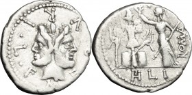 M. Furius L. f. Philus. AR Denarius, 119 BC. D/ Head of Janus, laureate, surrounded by legend. R/ Roma standing left, holding sceptre and crowning tro...