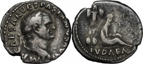 Vespasian (69-79 AD). AR Denarius, 69-71 AD. D/ Laureate head right. R/ Jewess seated right, on ground, mourning; behind her, trophy. RIC 15. AR. g. 2...