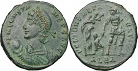Constans (337-361). AE Follis, Alexandria mint, 348-350. D/ Bust left, diademed, draped, cuirassed, holding globe. R/ Soldier advancing right, leading...